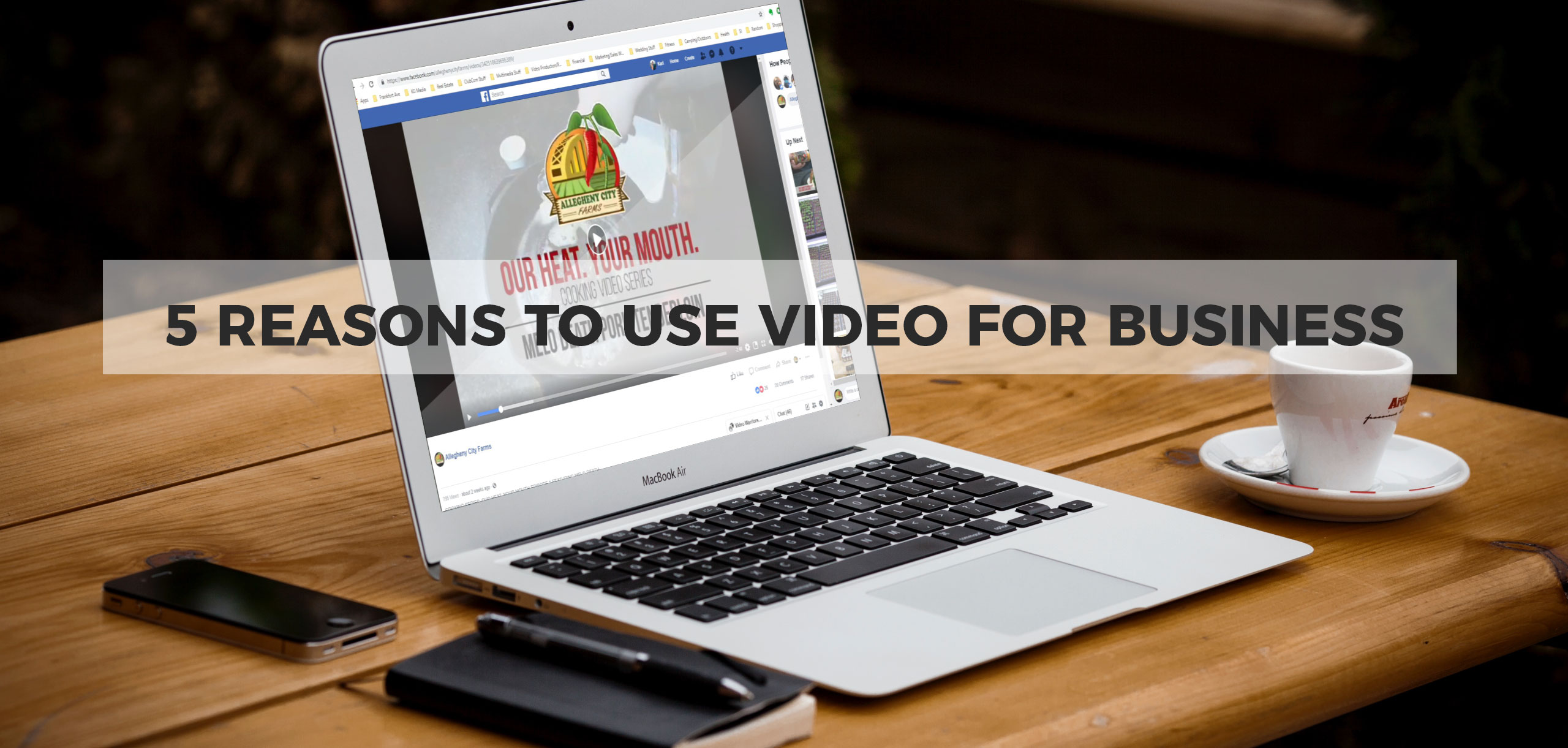 Images of a computer with a facebook video playing. Text overlay of 5 Reasons to Use Video For Business.